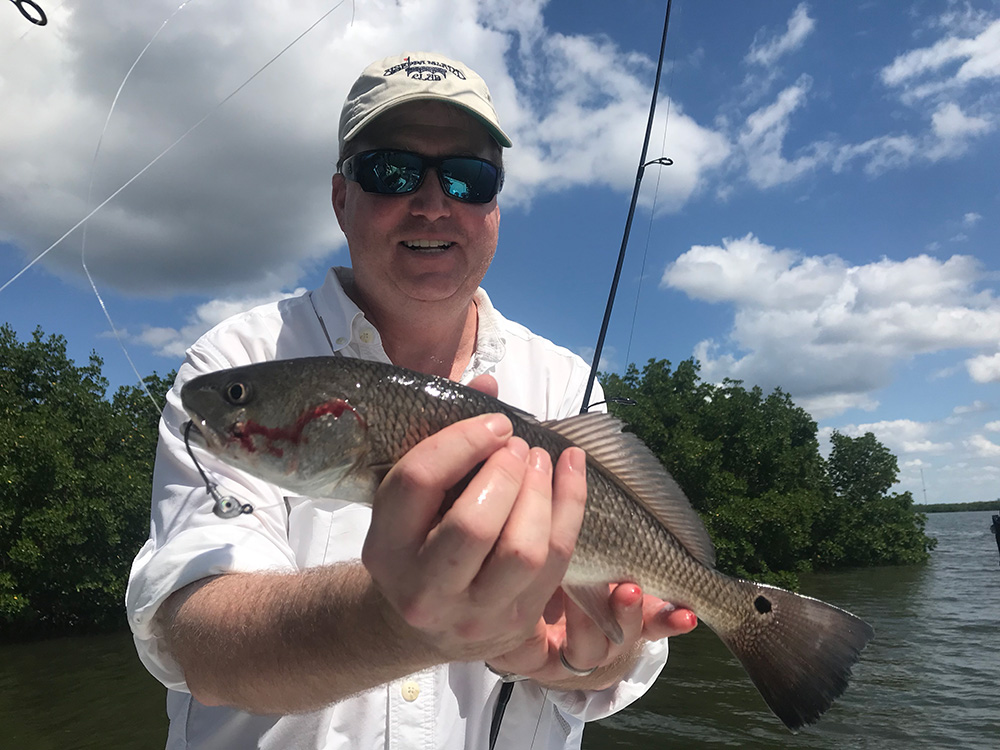 Drew with Redfish catch