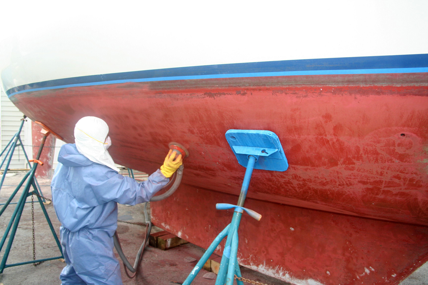 Vacuum sanding boat bottom